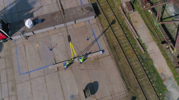 Workers Unfasten Ropes From Beam: Stock Video