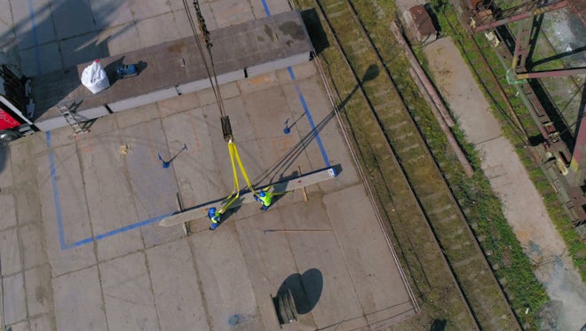 Workers Unfasten Ropes From Beam: Stock Video