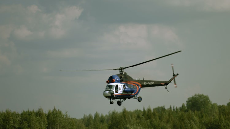 Waving From A Flying Helicopter: Stock Video