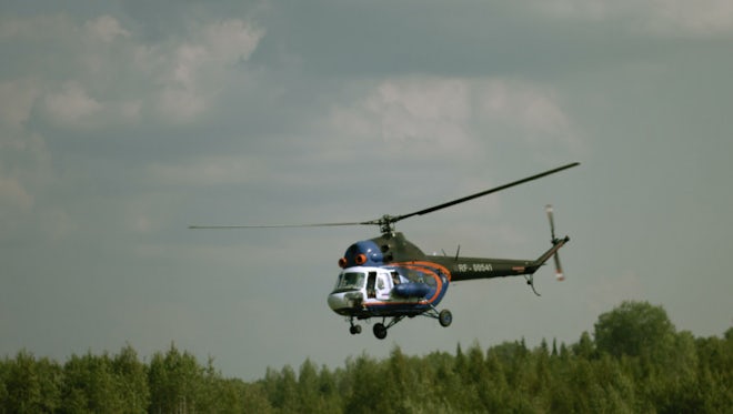 Waving From A Flying Helicopter: Stock Video